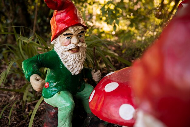 Garden gnome with funny hat outdoors