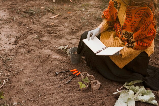 Gardener reading