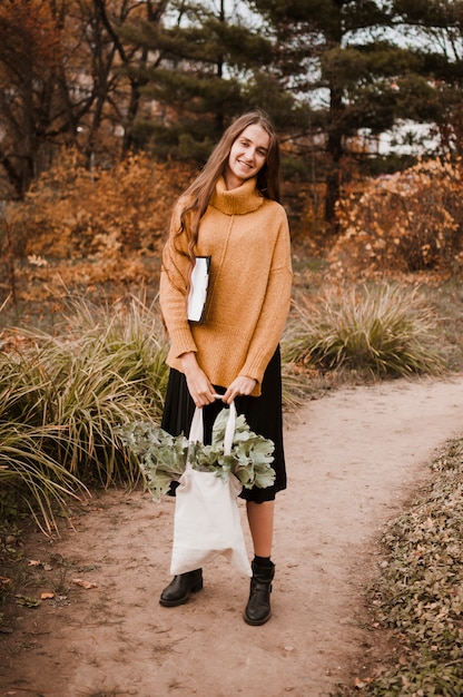 Free photo gardener with bag