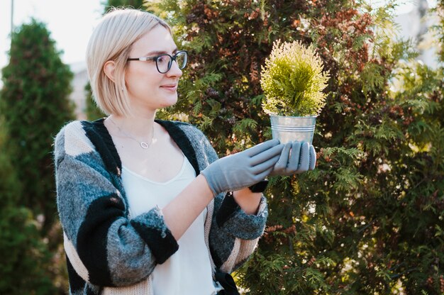 Gardener with plant