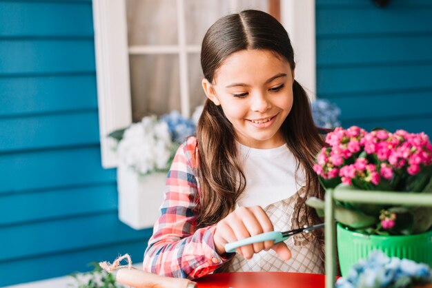 Gardening concept with girl and plant