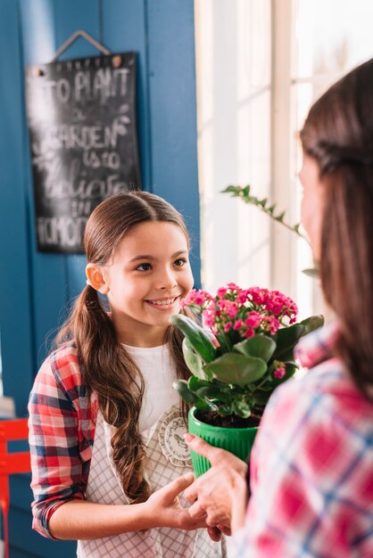 Gardening concept with mother and daughter