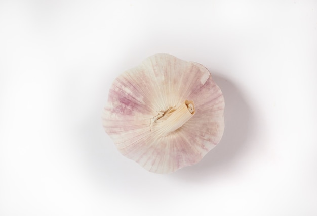 Garlic isolated on white surface. Fresh garlic cloves. Garlic isolated. Garlic cloves on white. Collection. freshly picked from home growth organic garden. Food concept.