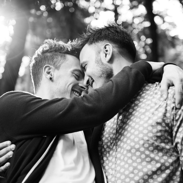 Gay couple dating in a park