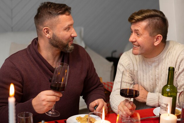 Gay couple spending time with family