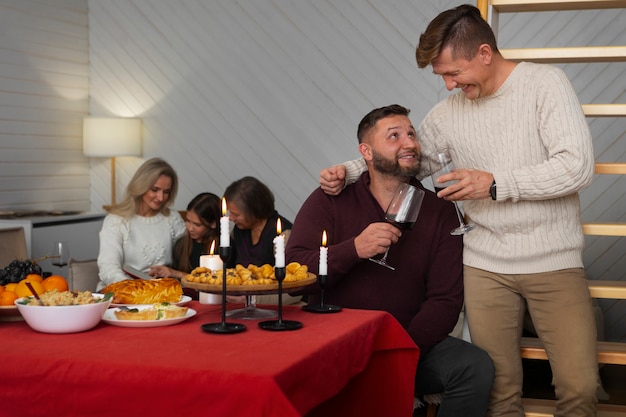 Gay couple spending time with family