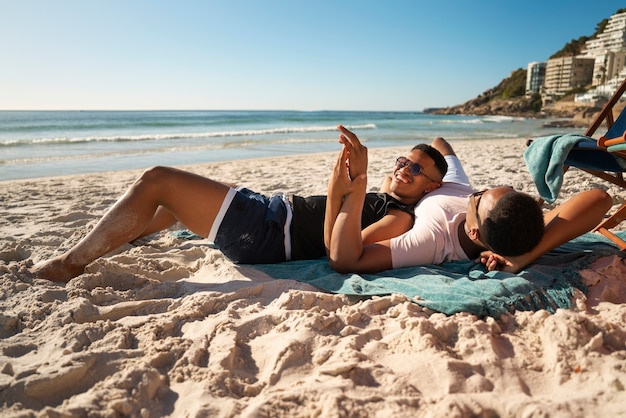 Free photo gay male couple on the beach