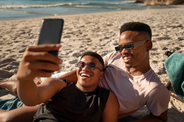 Free photo gay male couple on the beach