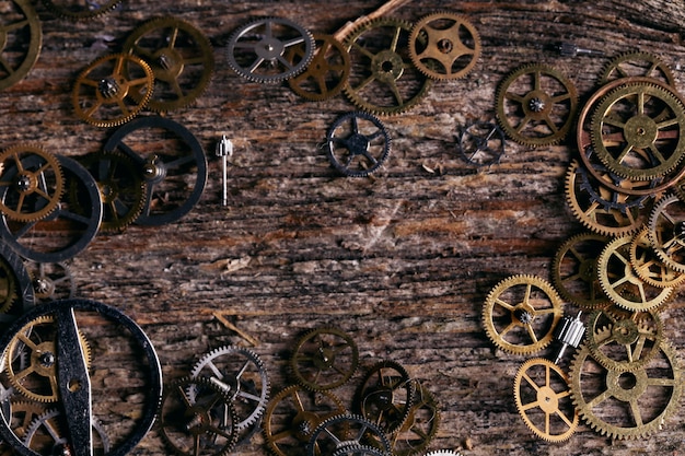 Gears on wooden table background