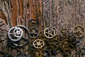 Free photo gears on wooden table