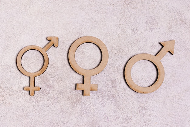 Free photo gender signs on marble background