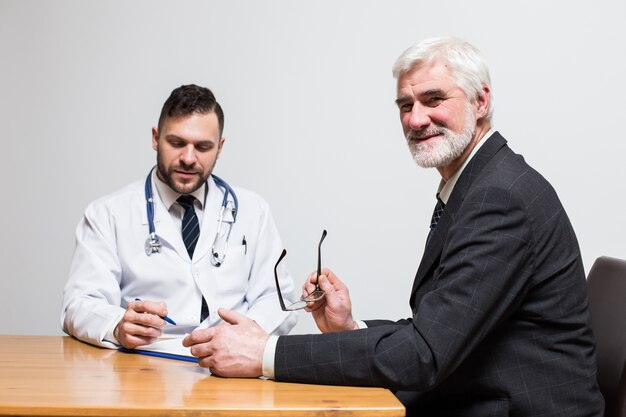 general pressure arm patient glasses pensioner