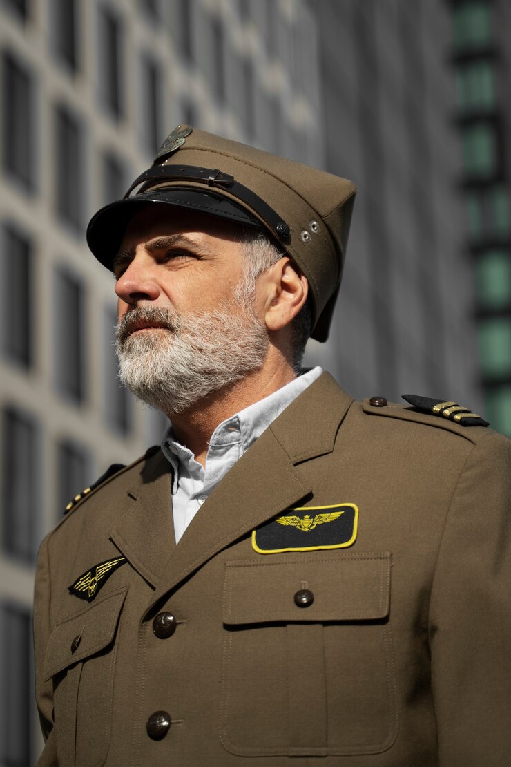 Free Photo general wearing uniform side view