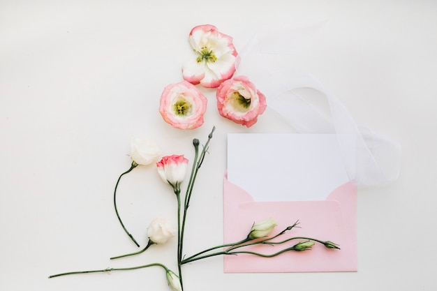 Gentle flowers and pink envelope
