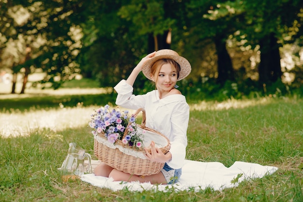 gentle girl sitting in a park