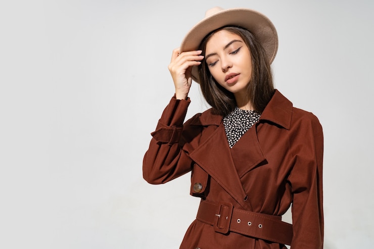 Free Photo gentle  pretty woman in beige hat and winter coat