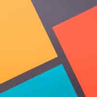 Free photo geometric background with shapes in four different colors