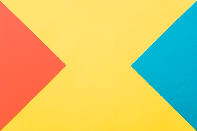 Geometric background in yellow, red and blue