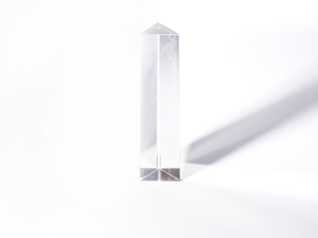 Geometric crystal with dark shadow isolated on white background