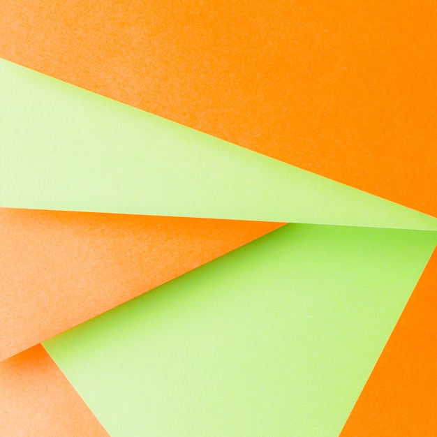 Free photo geometric shapes made with an orange and green backdrop