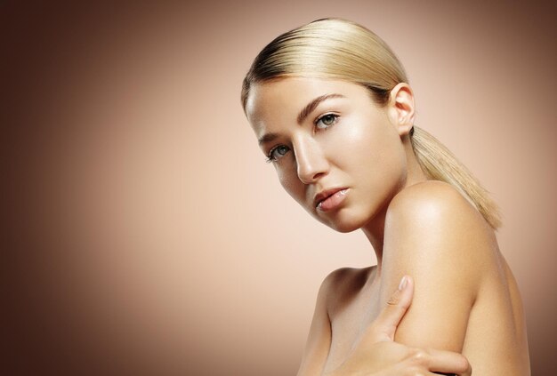 Georgeous woman portrait on a warm background