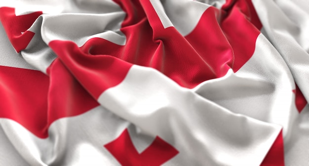 Georgia flag ruffled beautifully waving macro close-up shot