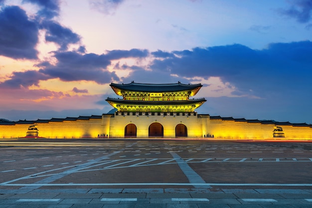 Geyongbokgung Palace and car light at sunset in Seoul, South Korea.