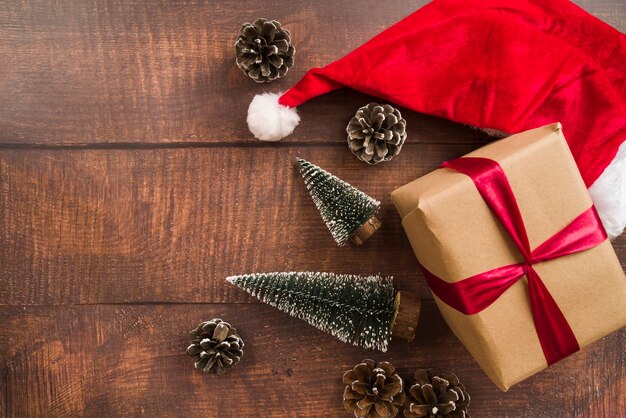 Gift box with red ribbon and Santa hat