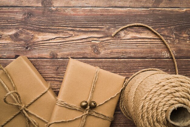 Gift boxes with rope roll on table