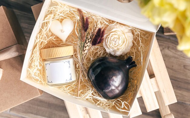 Gift set with candles and a vase for the holiday