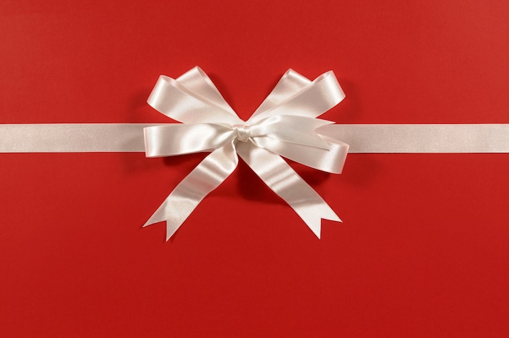 Free Photo a gift with a red paper