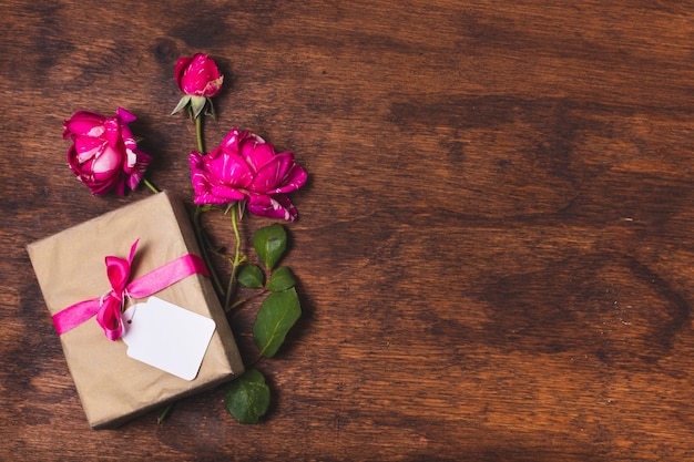 Gift with roses and copy space