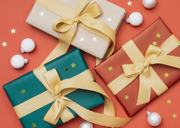 gifts with globes and golden stars for christmas