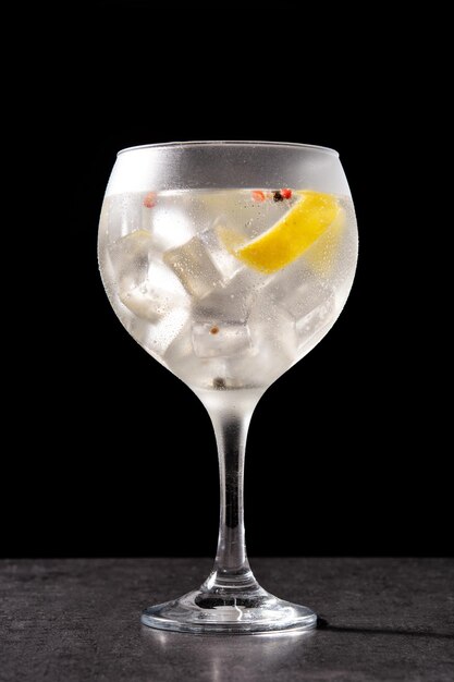 Gin tonic cocktail drink into a glass