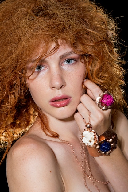 Ginger girl with big rings