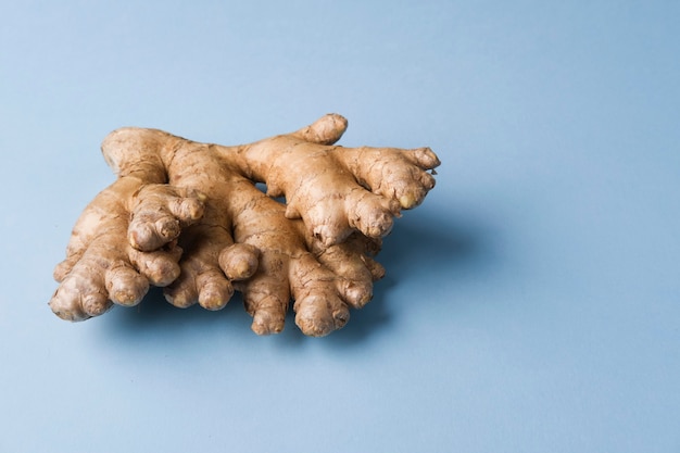 Premium Photo Ginger Root On Blue