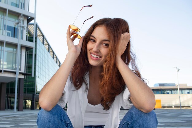 Ginger woman in a clean urban environment