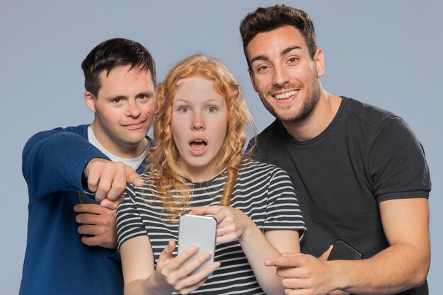 Ginger woman looking shocked next to friends