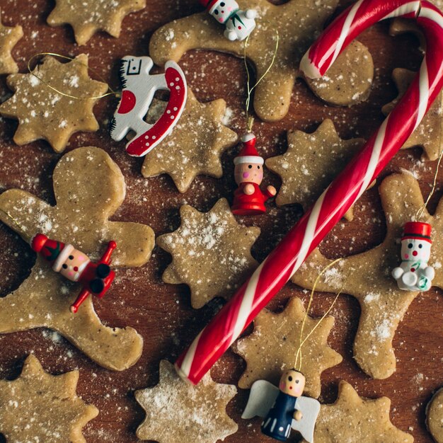 Gingerbread cookies on wooden background.