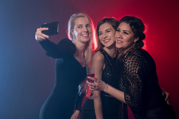 Girfriends taking selfie