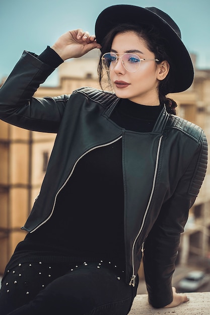 Free Photo | Girl in black hat and leather jacket