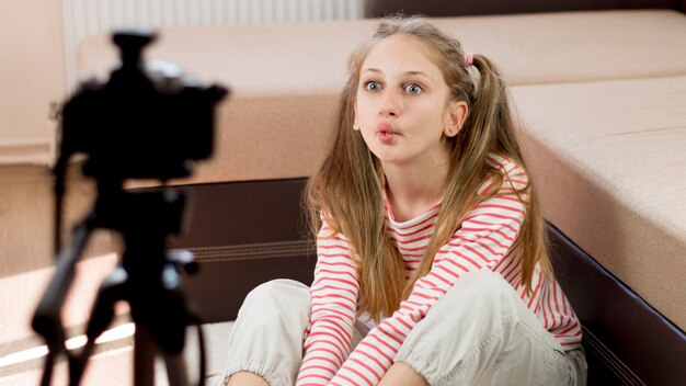 girl blogger recording herself