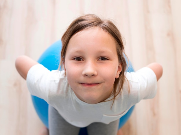 Girl on bouncing ball