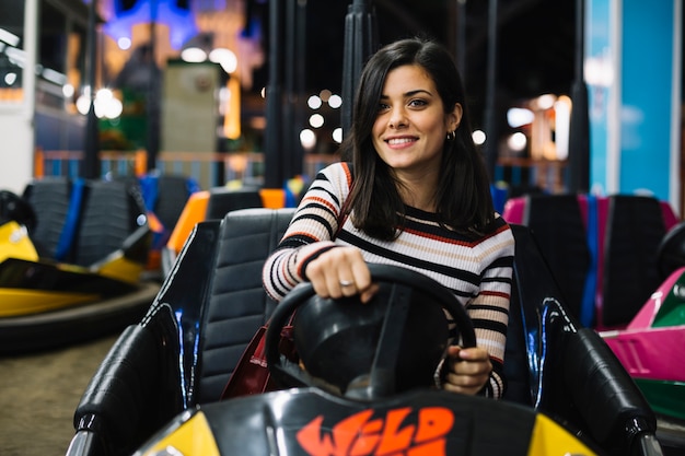 Free photo girl on bumper car