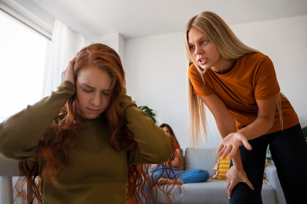 Girl criticizing teen low angle