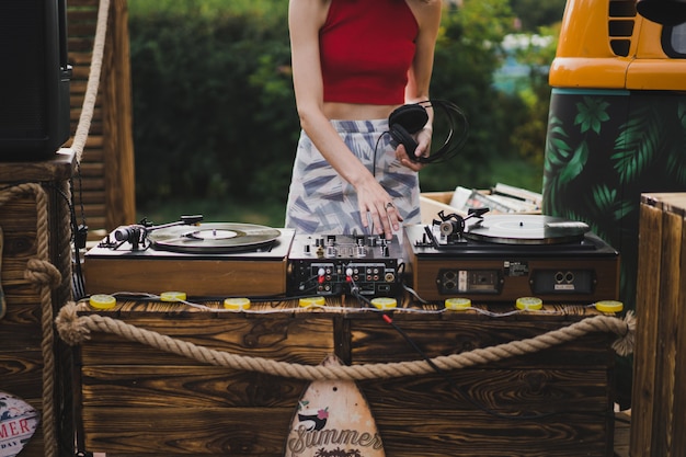 girl dj playing vinyl records