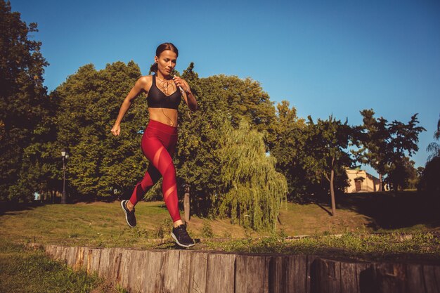 Girl doing exercise in the park