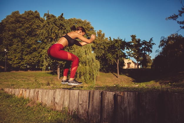 Free photo girl doing exercise in the park