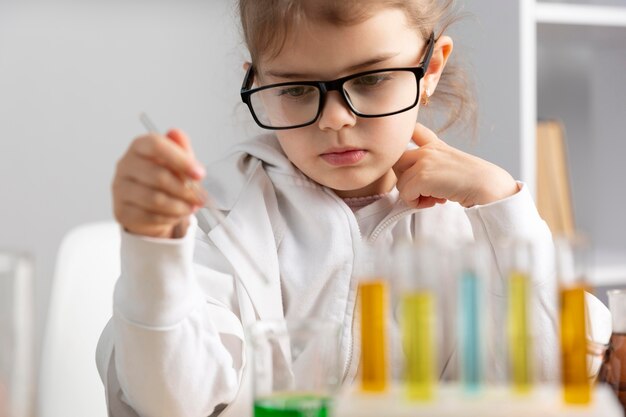 Girl doing experiments in laboratory