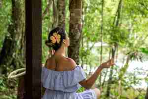 Free photo girl in a dress meditates